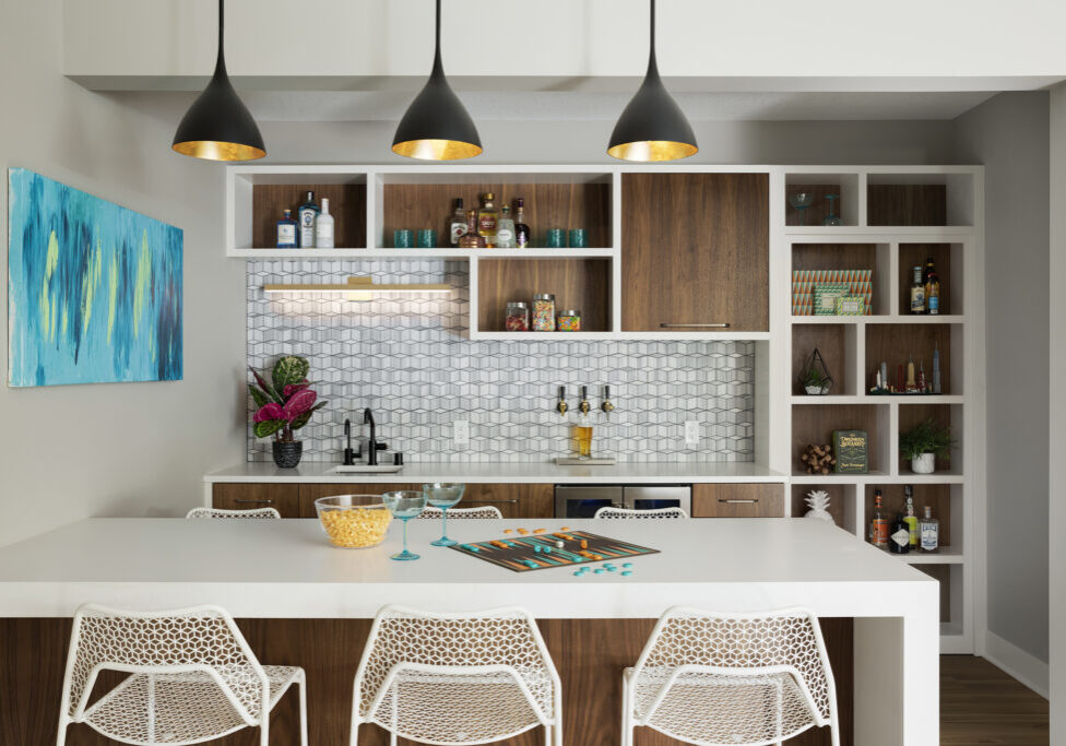 Modern lower level bar with secret door